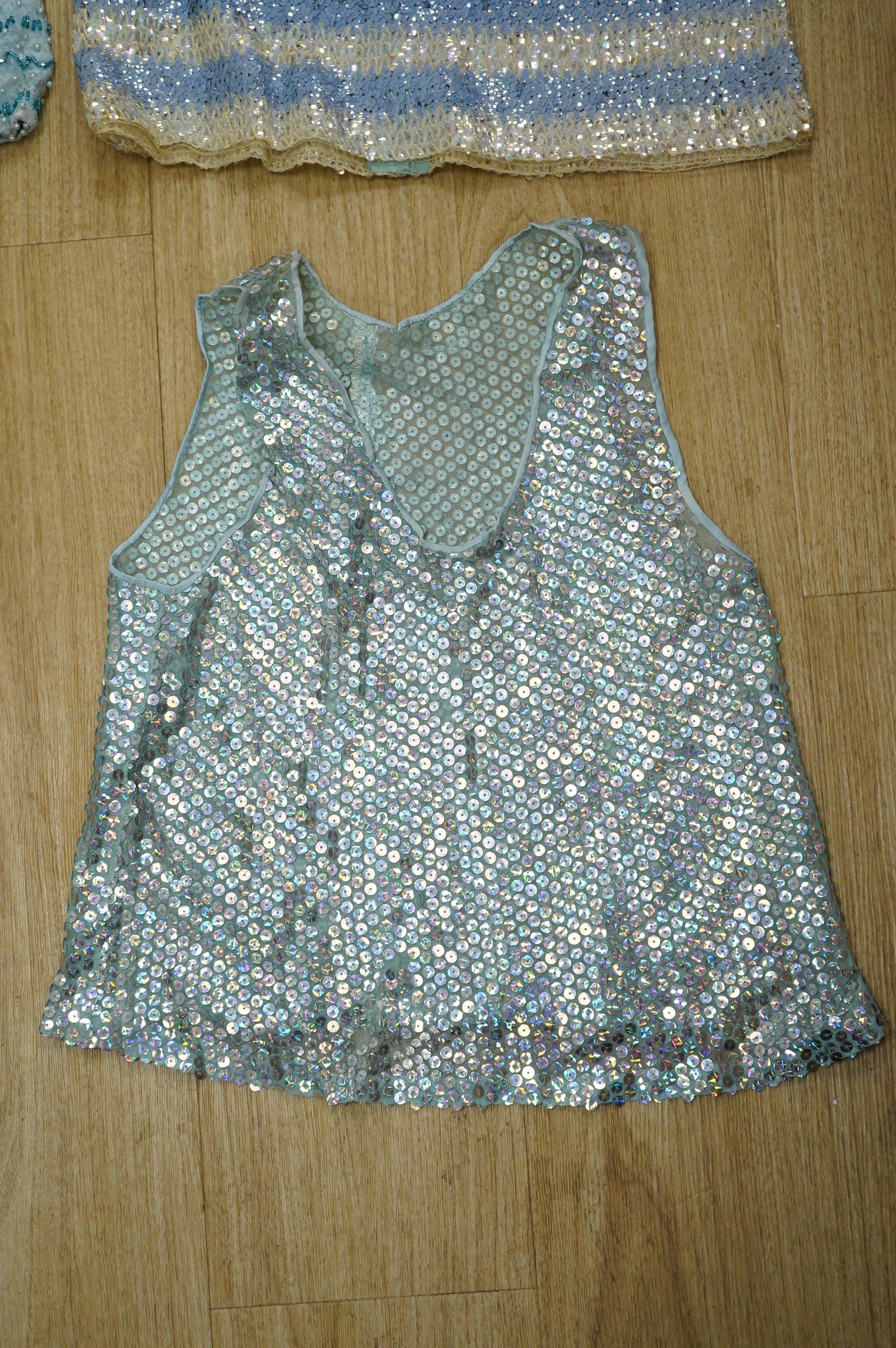 Two 1960's beaded mini dresses, a sequin top and later jumpsuit